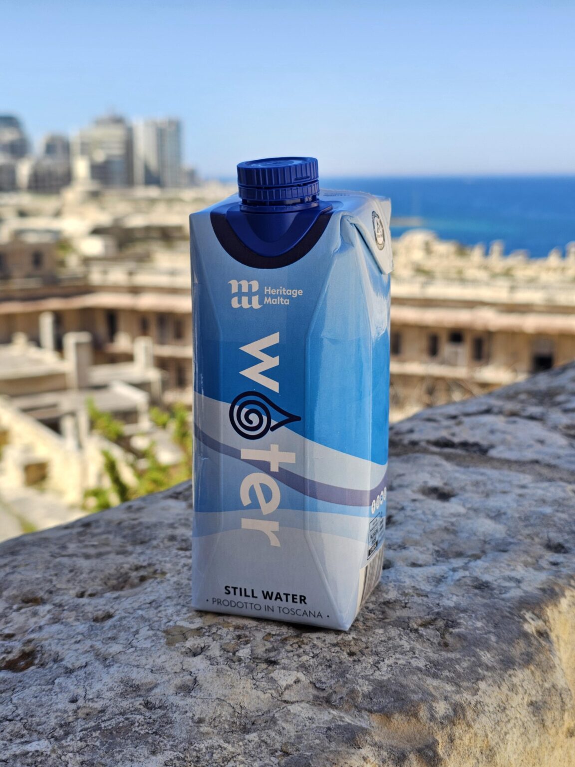 Besides museums, where else can you buy boxed water?