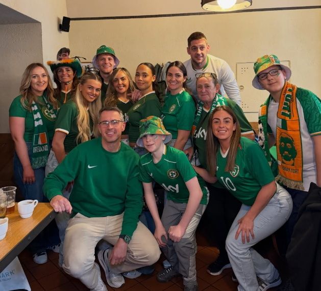 RTÉ presenter Kieran Cuddihy with members of Troy Parrott's family in Prague. Photo: RTÉ