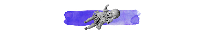 black and white doll on top of a wash of purple colour