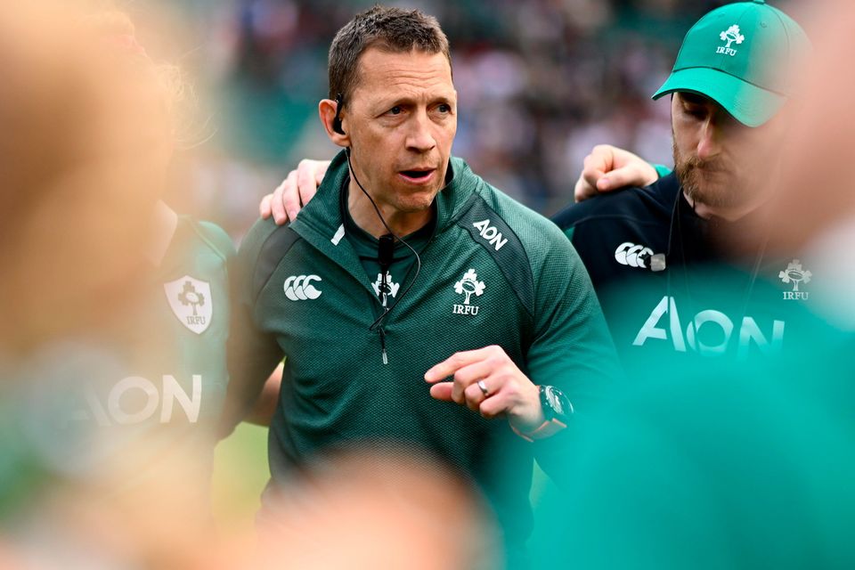 Ireland head coach Scott Bemand talks to his players after Saturday's defeat to England in Twickenham. Photo: Shauna Clinton/Sportsfile