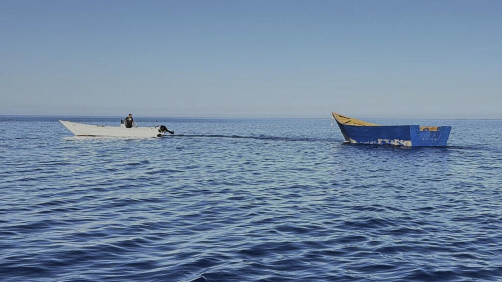 Two dead, dozens missing after migrant boat capsizes in Mediterranean