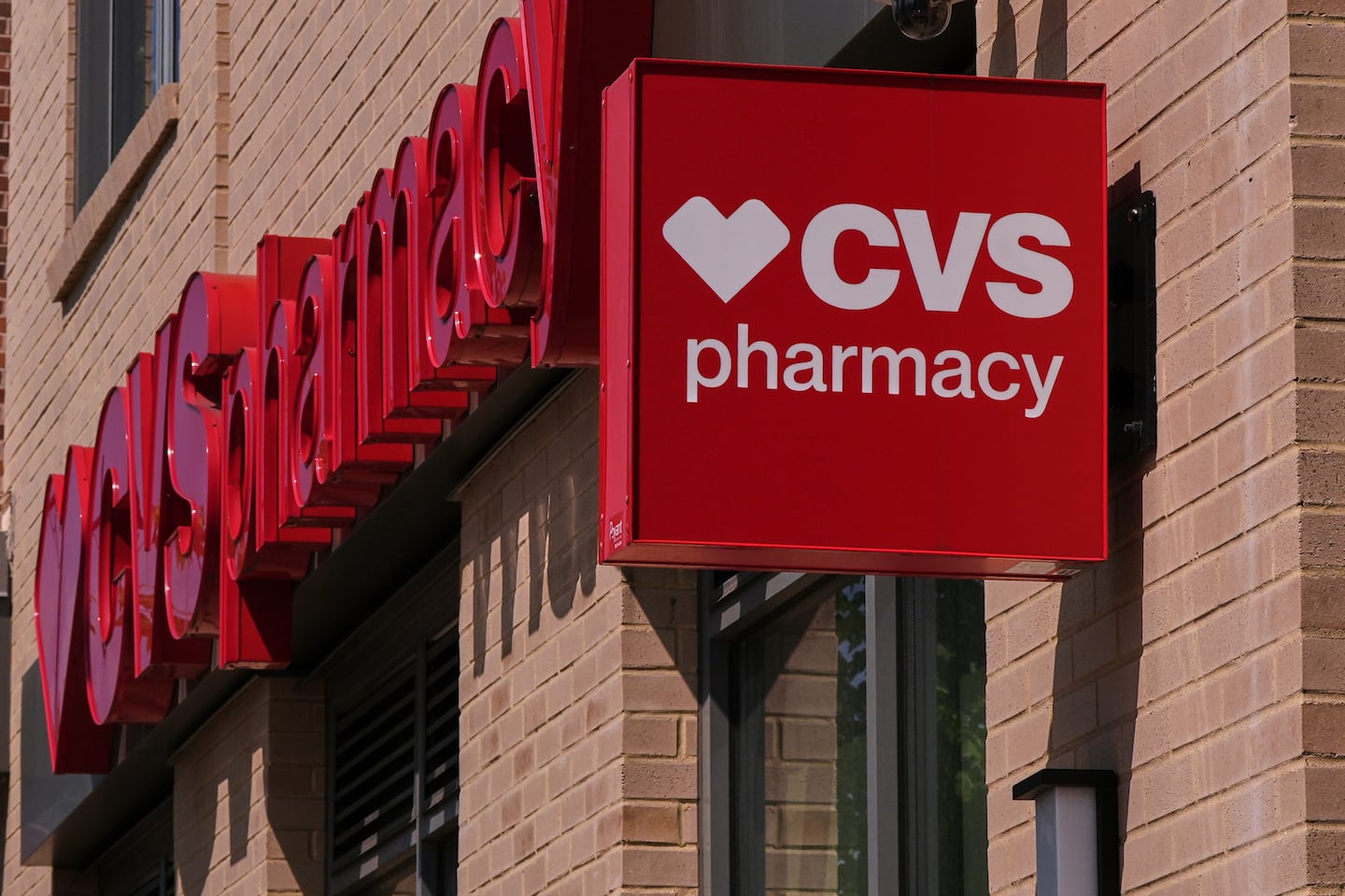 The CVS logo is displayed at a pharmacy and retail location in Newton on Aug. 13, 2025.