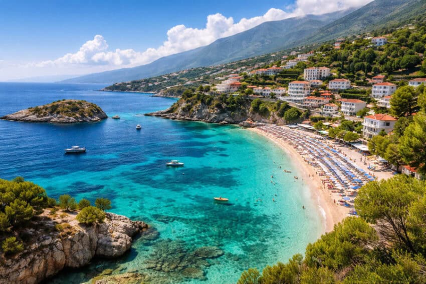Beautiful albanian coastal bay with turquoise waters and scenic mountains.