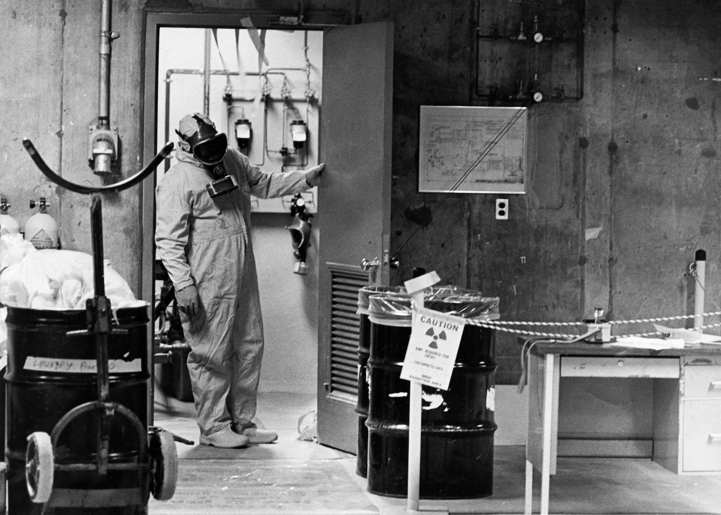 A worker was suited up to work in a radiation area of Plymouth's Pilgrim Nuclear Power Station in 1975.