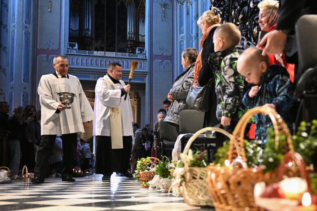 Roman Catholic Christian worshipers were blessed during a Holy Saturday service at the Cathedral of the Assumption of the Blessed Virgin, in Lviv.
