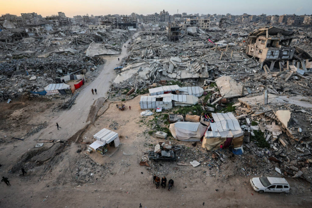 Israeli fire kills 12 in Gaza, medics say