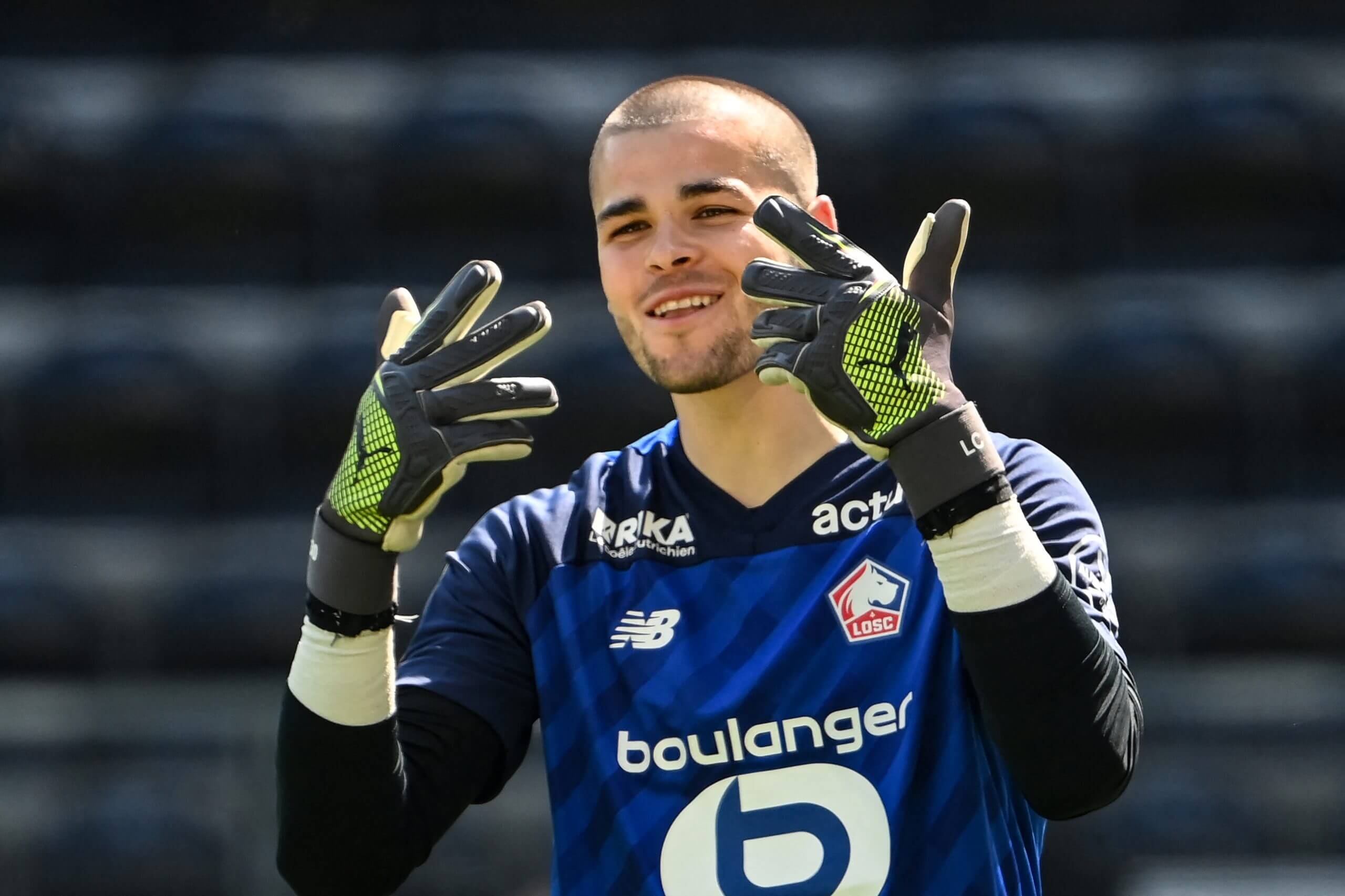 Lille's French goalkeeper Lucas Chevalier gestures at the Raymond-Kopa Stadium in Angers,