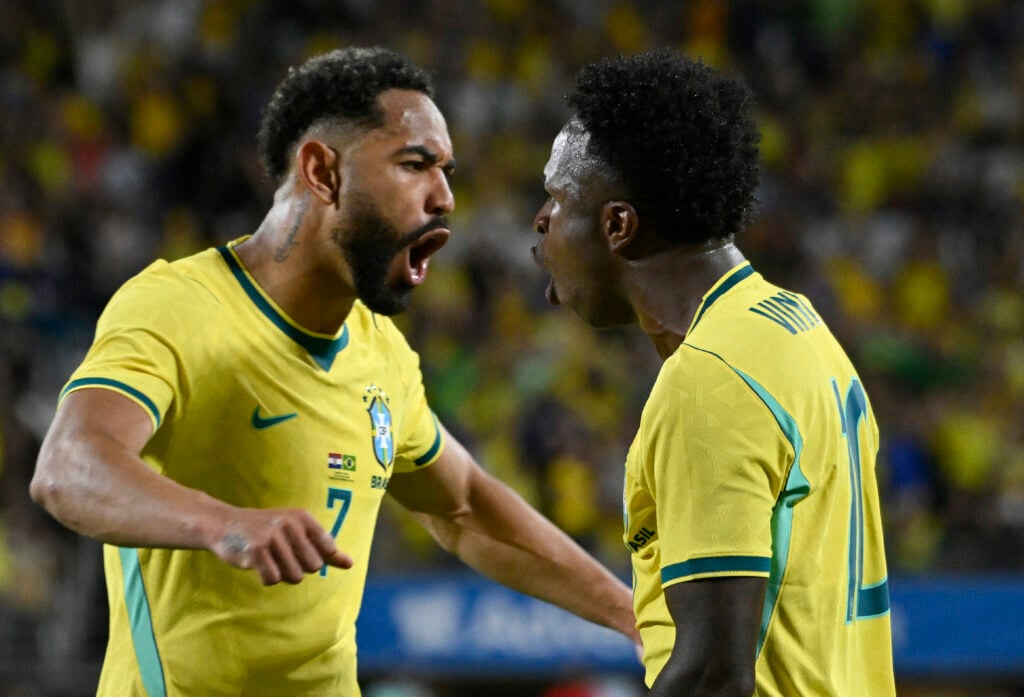 Brazil's forward #07 Matheus Cunha and Brazil's forward #10 Vinicius Junior celebrate