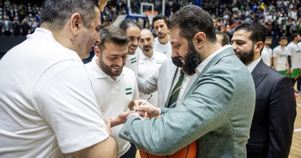 Syria's President tries basketball diplomacy in drive to boost ties with Lebanon