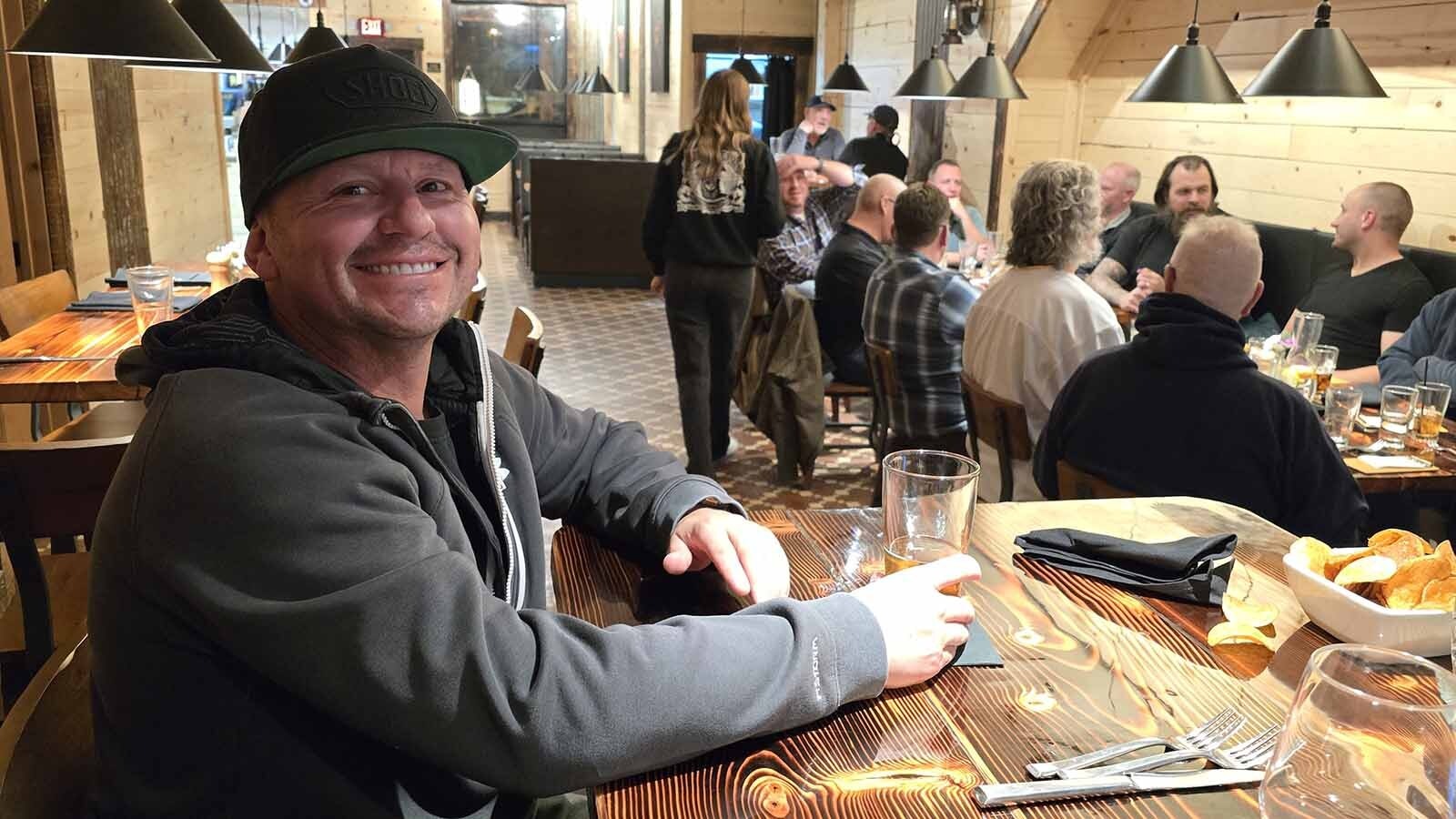 Kemmerer resident Clint Unsworth enjoys a meal at a newly opened restaurant called Bootleggers and talks with Cowboy State Daily about what he thinks the community needs to make the most of a coming economic boom, following TerraPower's new Natrium plant.