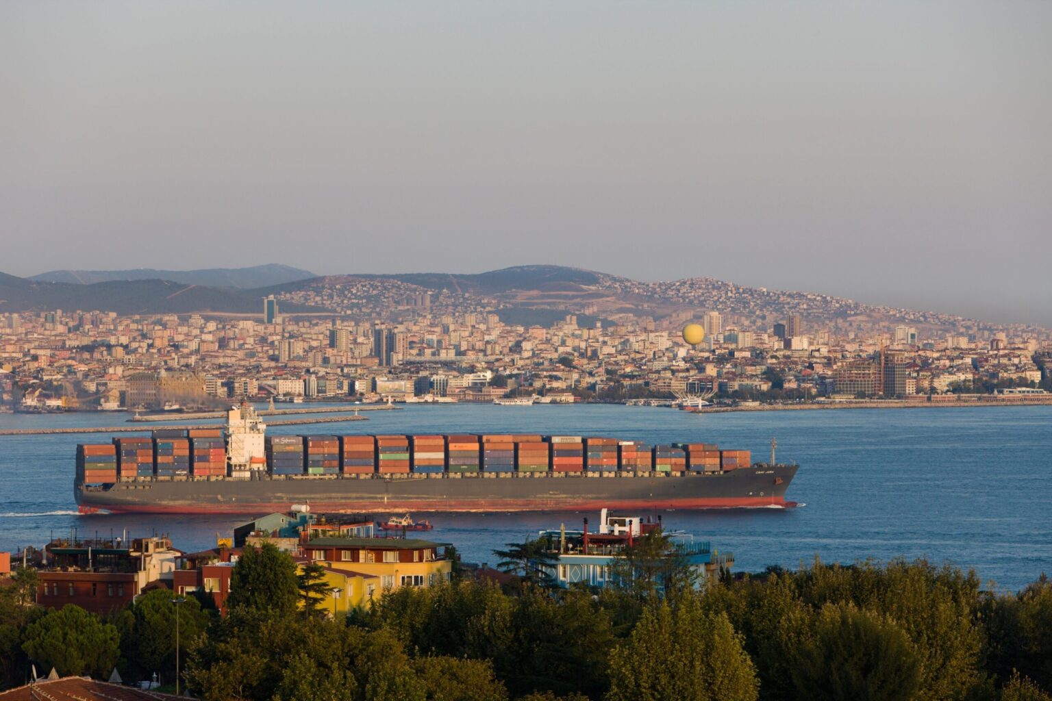 A container ship passes through Istanbul. Turkish exports fell 6.4% year-on-year in March