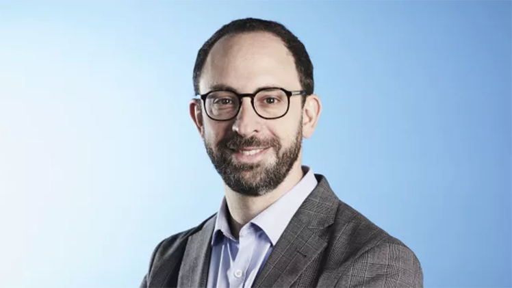 Professional headshot of Dr. Harry Sokol, a professor in the Gastroenterology Department of the Saint Antoine Hospital in Paris, the co-director of the Microbiota, Gut & Inflammation team at Sorbonne Université in Paris, and group leader in the Micalis institute.