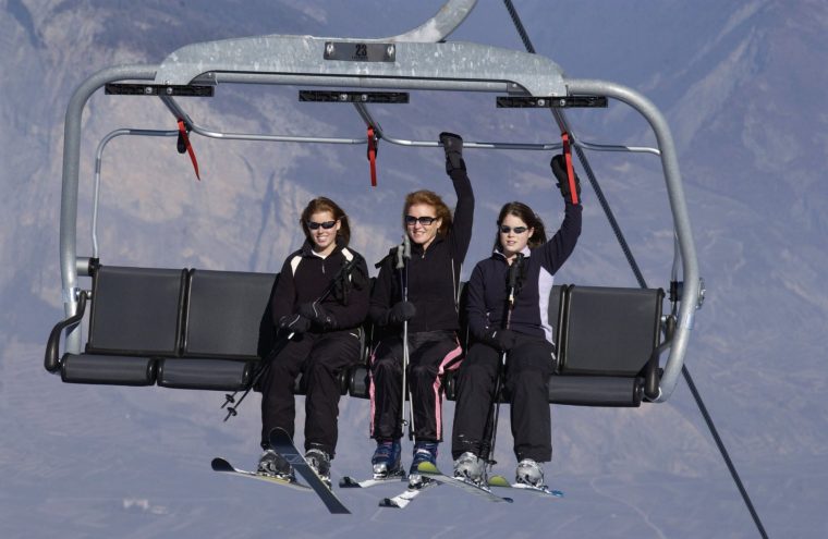 VERBIER, SWITZERLAND - FEBRUARY 16: Sarah, Duchess Of York, With Her Daughters, Princess Beatrice And Princess Eugenie Enjoying A Ski-ing Holiday Together In Verbier. The Family Are Sitting On A Chair-lift. (Photo by Tim Graham Photo Library via Getty Images)