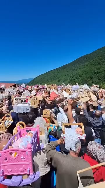 Every year after Easter, hundreds of childless couples carry cradles up to a hilltop church in rural Georgia to pray for a child — a centuries-old tradition called Tsachkhuroba