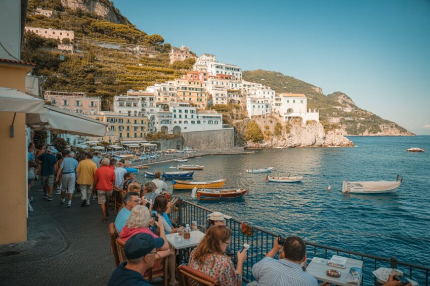 Seaside town in italy with colorful buildings and a vibrant waterfront.