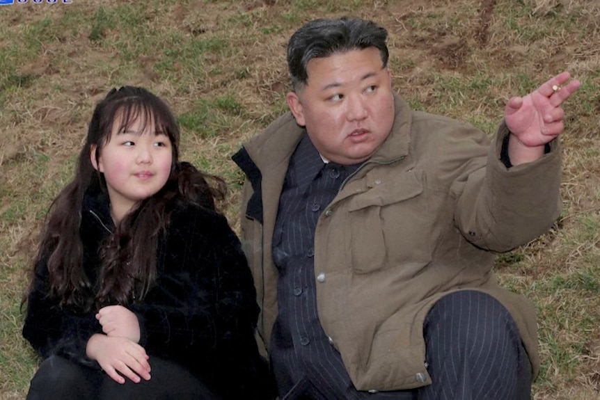 Kim Jong Un and his daughter when she was about 11 years old.