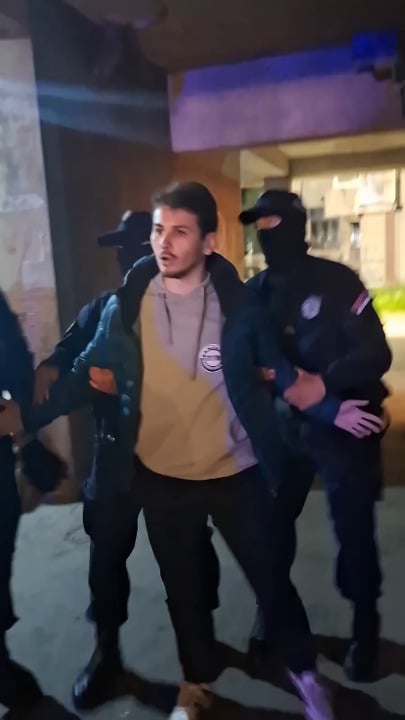 Police "Criminals" arrest and "kidnap" the gathered citizens