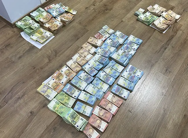 Seized cash from the fraud operation Albania fraud call centres