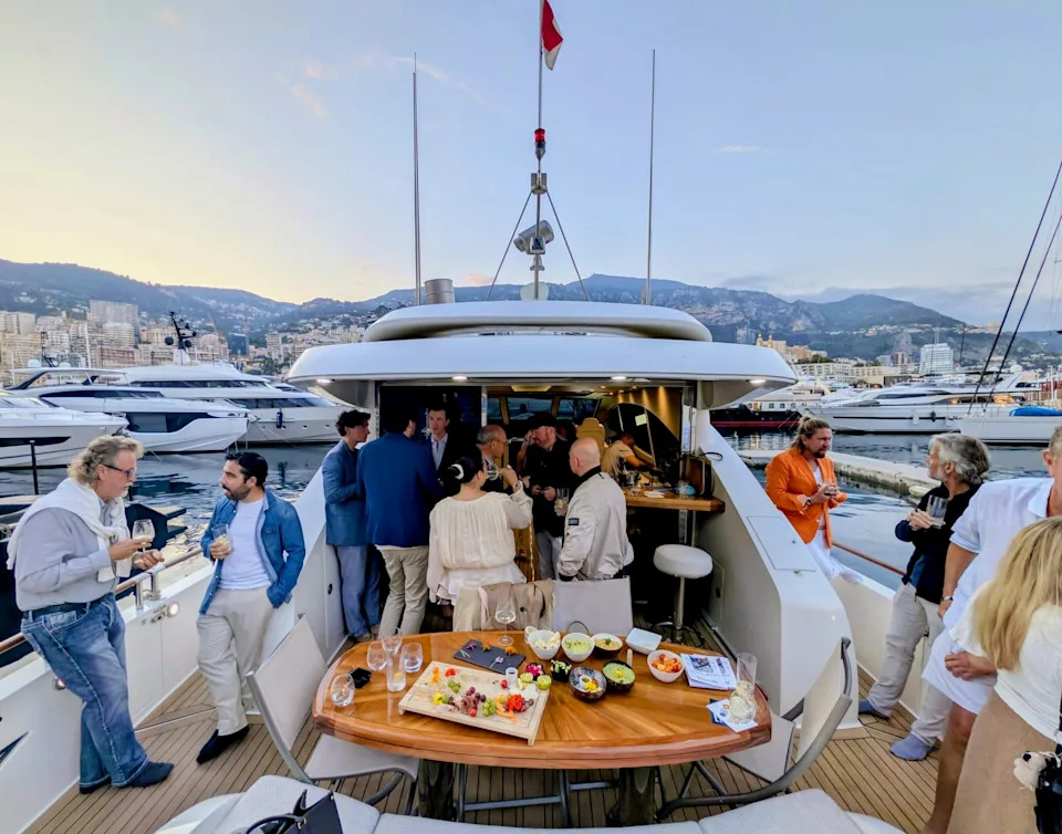 Guests gathered on board for cocktails, conversation, and the kind of effortless hospitality that defines the best yachting experiences.