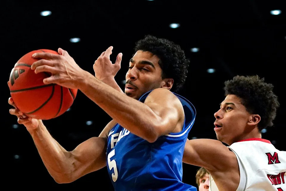 Buffalo Bulls guard Daniel Freitag (5) rebounds the ball in the first half of a NCAA menâ€™s basketball game between the Miami RedHawks and Buffalo Bulls, Saturday, Jan. 17, 2026, at Millett Hall in Oxford, Oh.