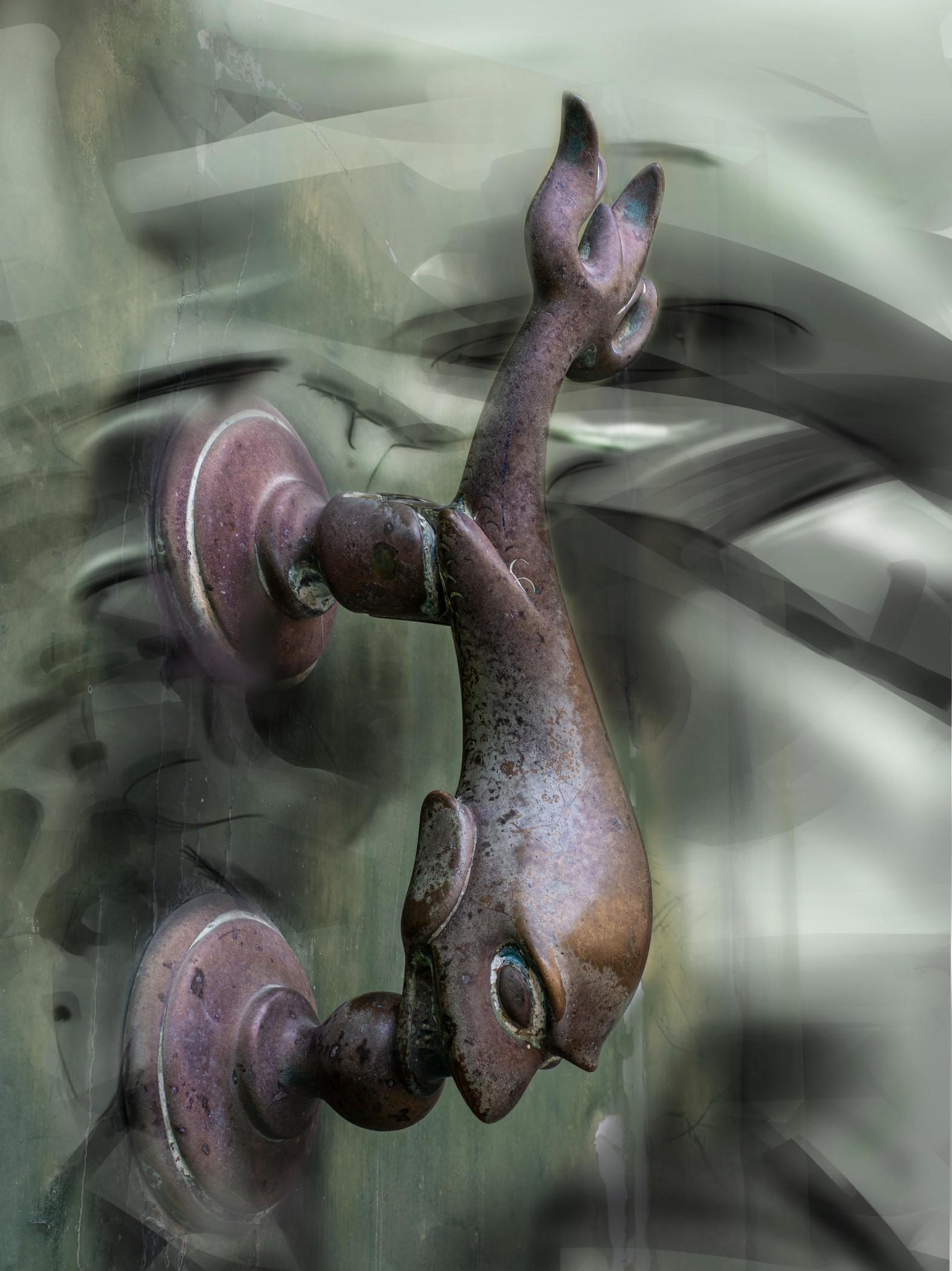 The installation reimagines traditional Maltese doorknockers, including figures such as a dolphin.