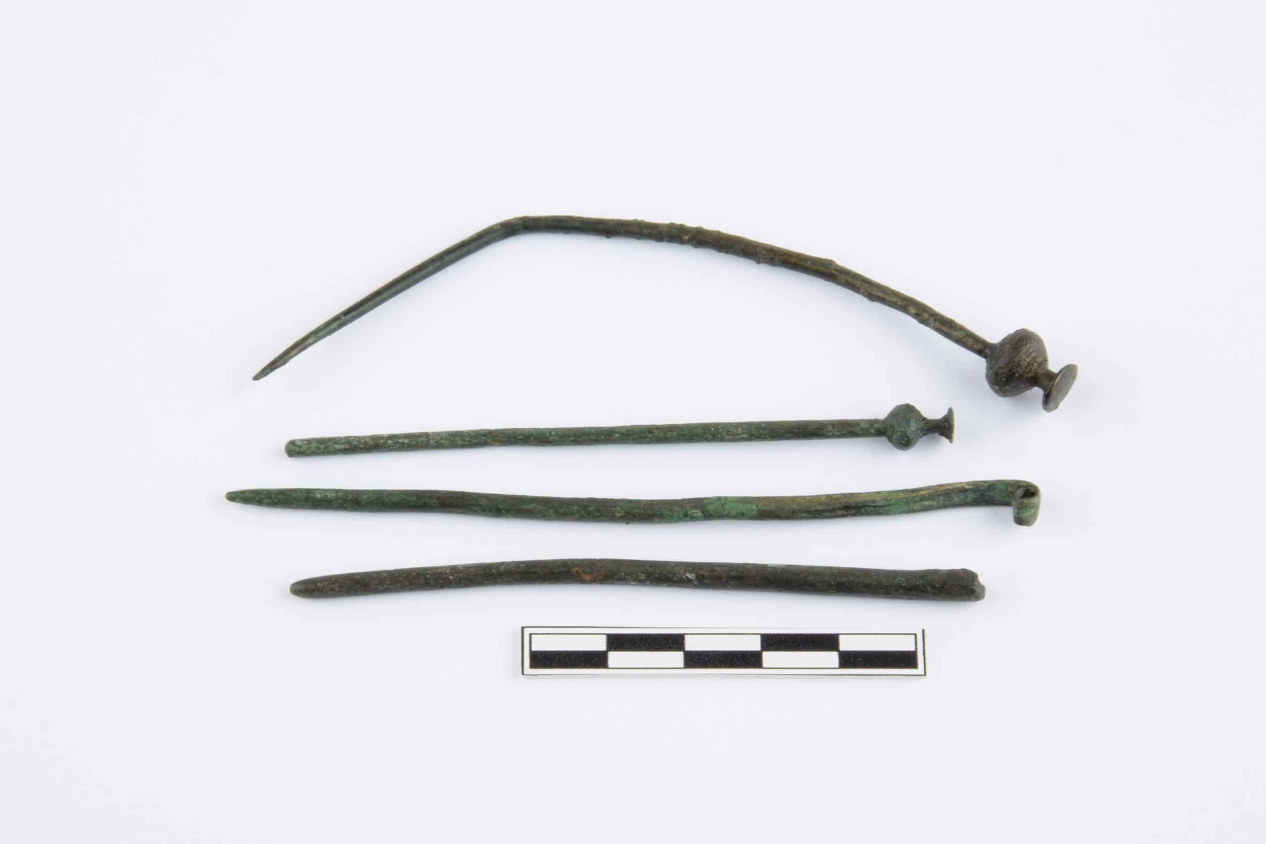 bronze needle with a Cypriot head found at excavation site