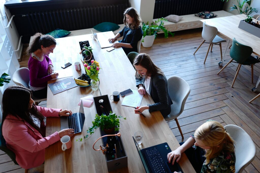Women working. The image is illustrative. Photo by CoWomen on Unsplash.