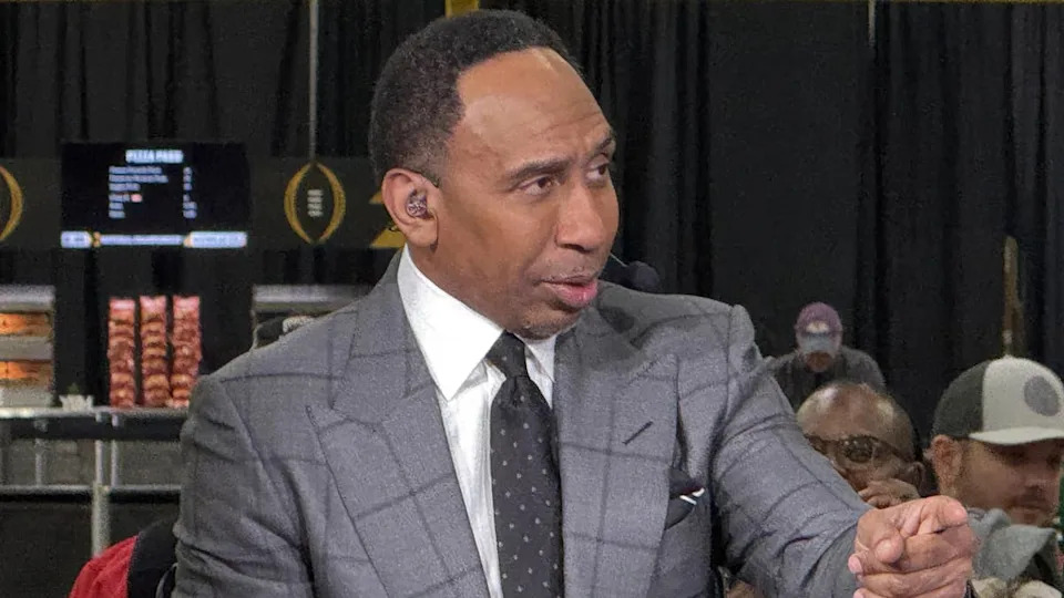 Jan 20, 2025; Atlanta, GA, USA; ESPN personality Stephen A. Smith on the ESPN First Take set at the CFP Fan Central at the George World Congress Center. Mandatory Credit: Kirby Lee-Imagn Images© Kirby Lee-Imagn Images.