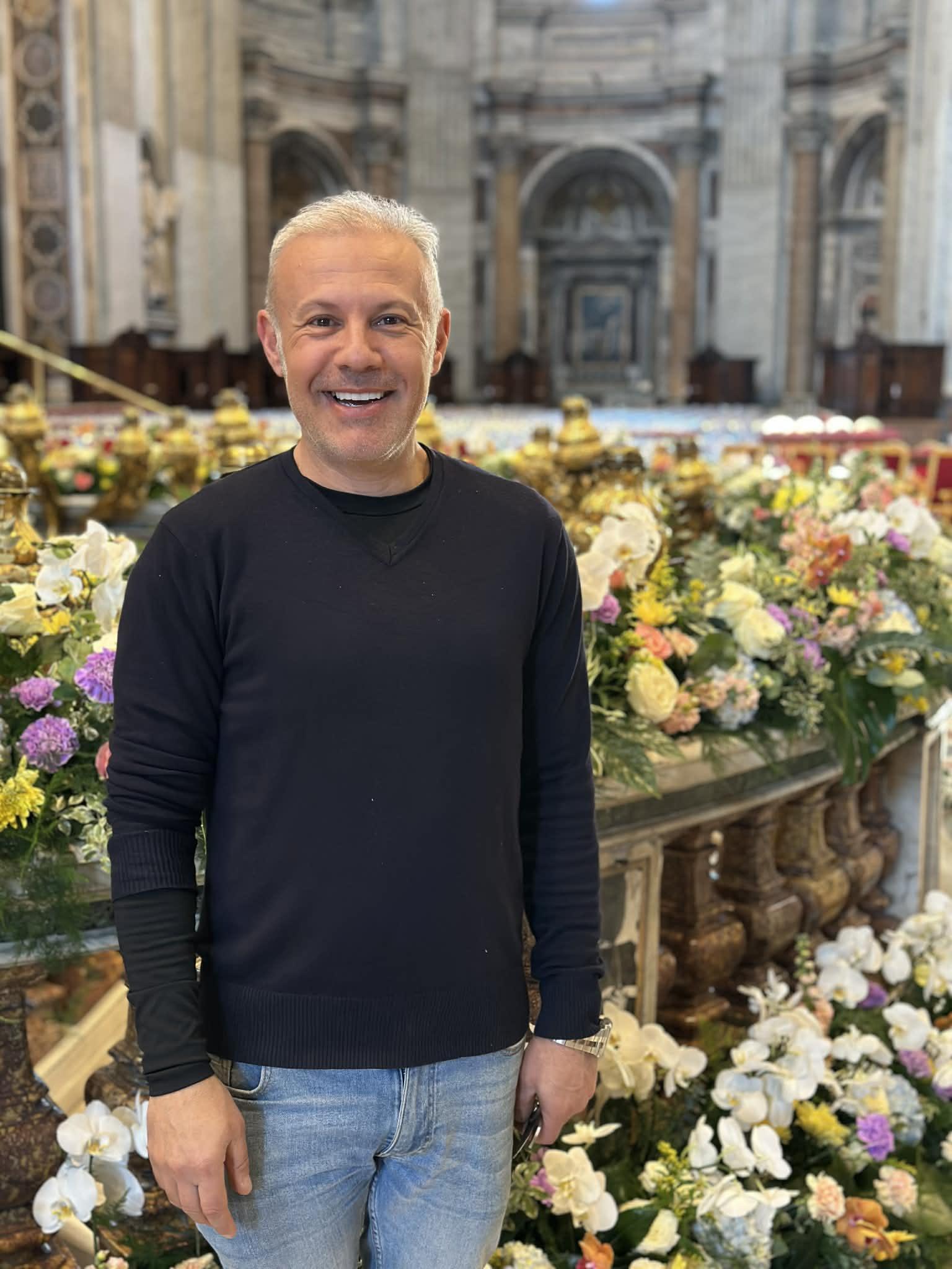 All smiles after working long hours to complete the floral displays inside St Peter's Basilica in time for Easter Mass. Photo courtesy of David Grech
