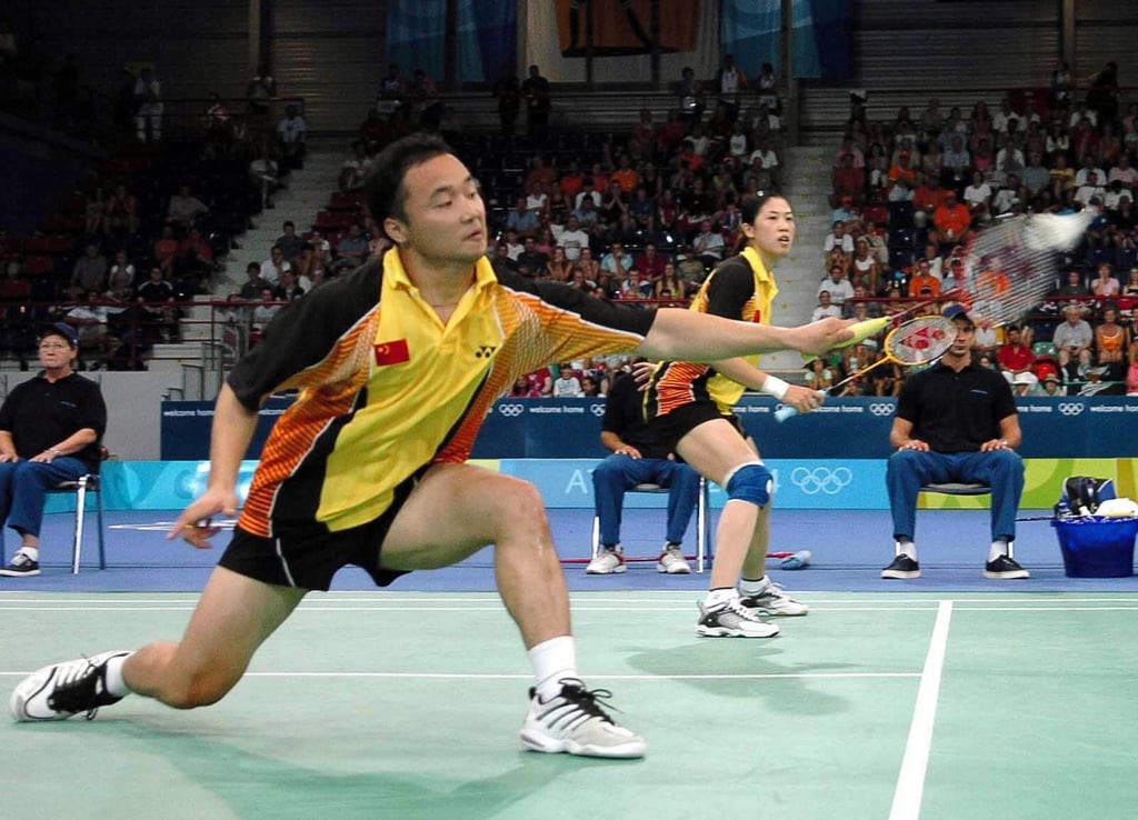 Zhang Jun (left) and his partner Gao Ling defended their gold medal in mixed doubles at the 2004 Athens Olympics, Photo: Xinhua Zhang Jun (left) and his partner Gao Ling defended their gold medal in mixed doubles at the 2004 Athens Olympics, Photo: Xinhua