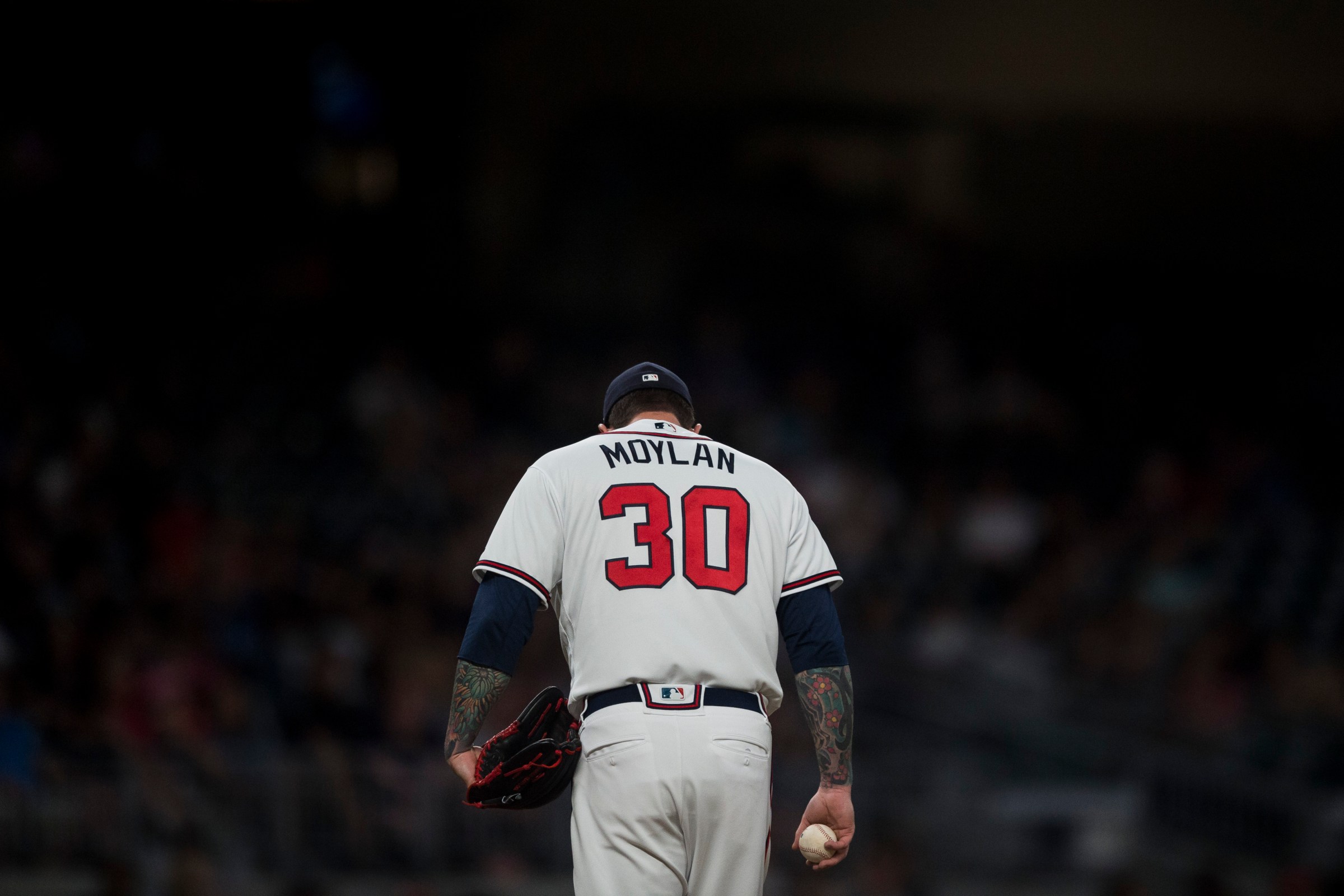 ATLANTA, GA - MAY 18: Peter Moylan #30 of the Atlanta Braves pitches during the game against the Miami Marlins at SunTrust Park on May 18, 2018, in Atlanta, Georgia. The Marlins won 2-0.(Photo by Cameron Hart/Beam Imagination/Atlanta Braves/Getty Images)