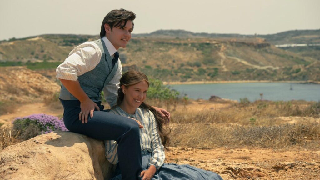 Louis Partridge as Tewkesbury beside Millie Bobby Brown as Enola in Enola Holmes 3