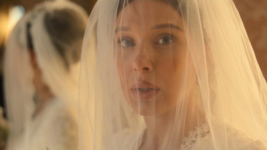 Millie Bobby Brown as Enola Holmes wearing wedding veil in Enola Holmes 3