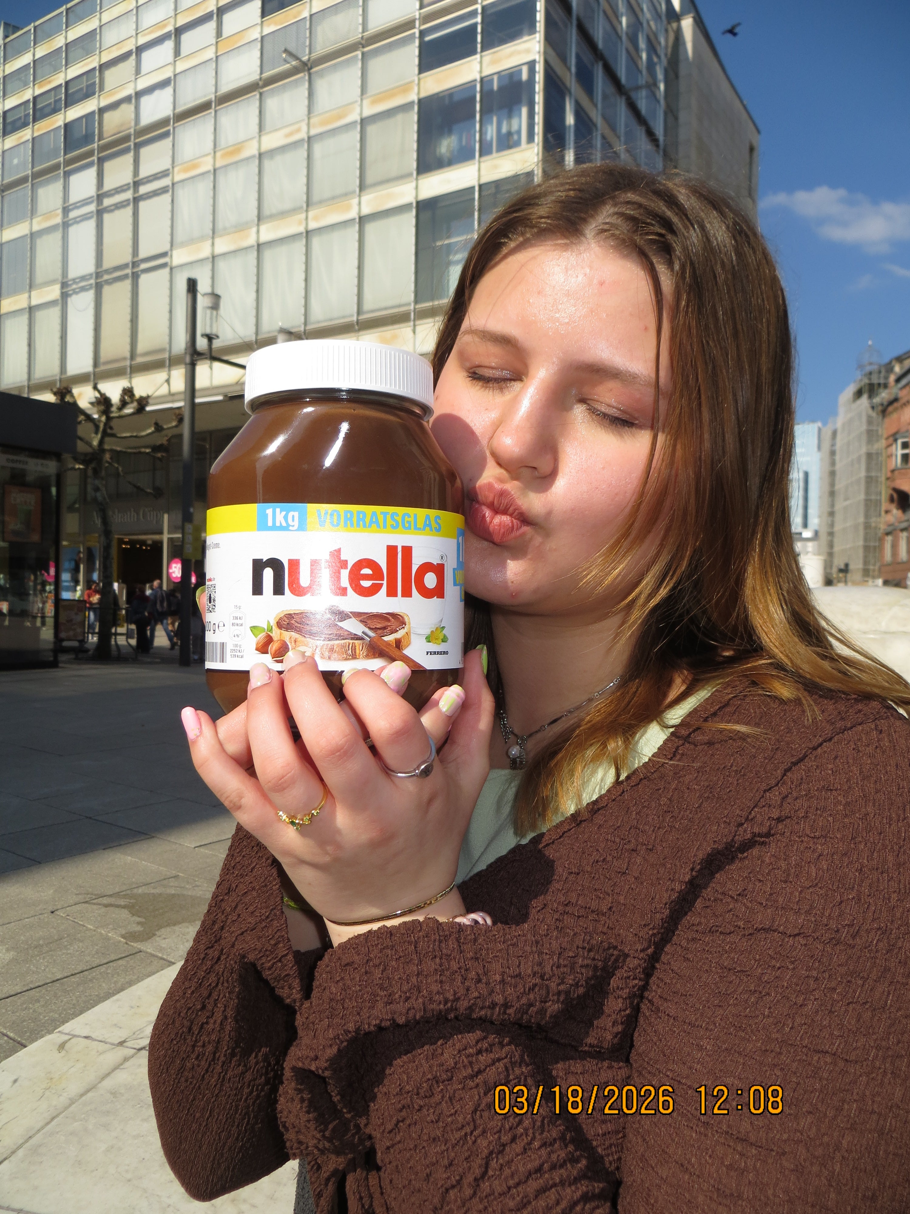 A photo of me kissing a jar of German Nutella