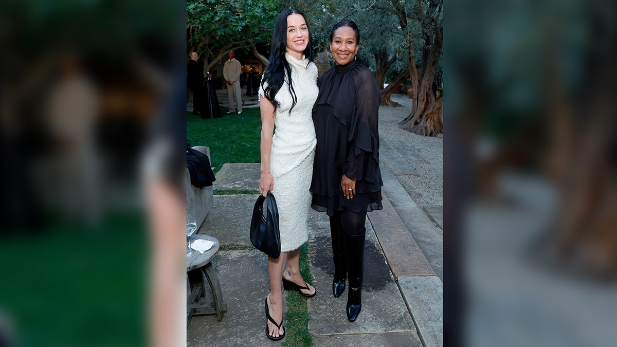 Katy Perry poses with Nicole Avant at Montecito event.