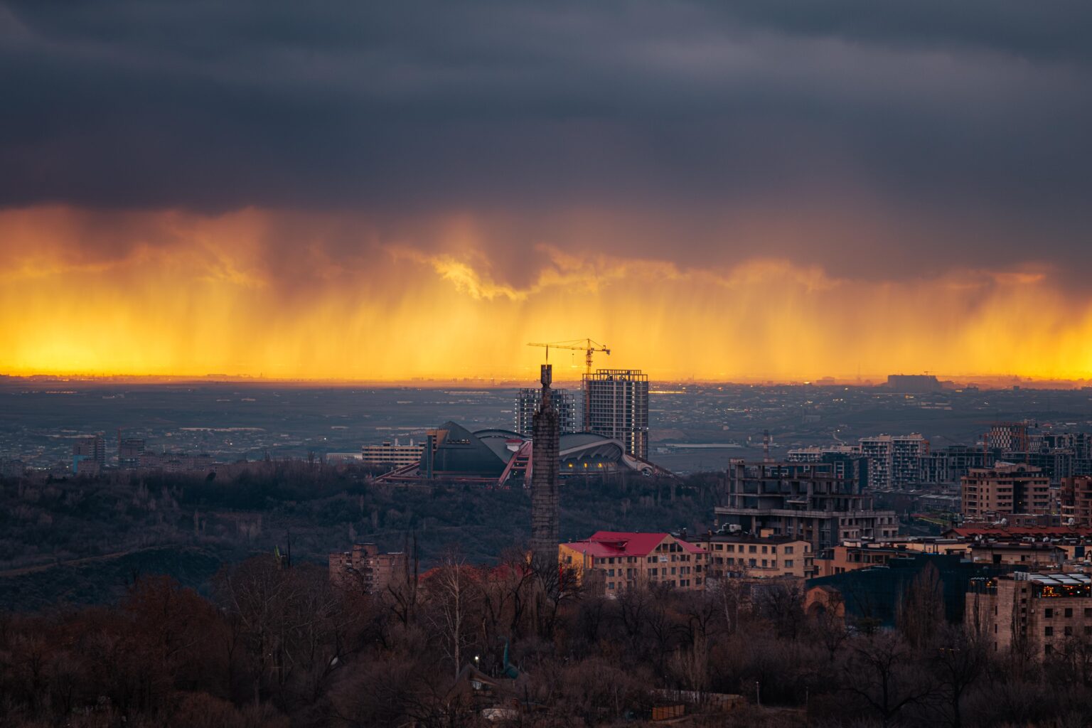 It's rain and sunset same time on horizon