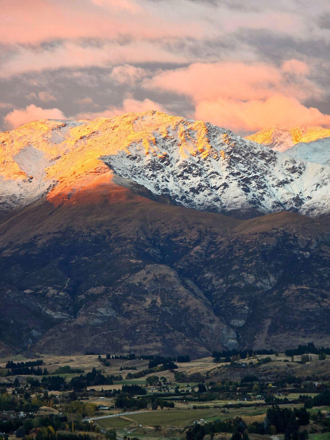 The beauty created by the sun reflecting on the mountaintop.