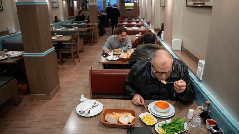People eat traditional tripe soup, known as "iskembe" in Turkish and "patsas" in Greek, in a restaurant in Istanbul, Turkey.