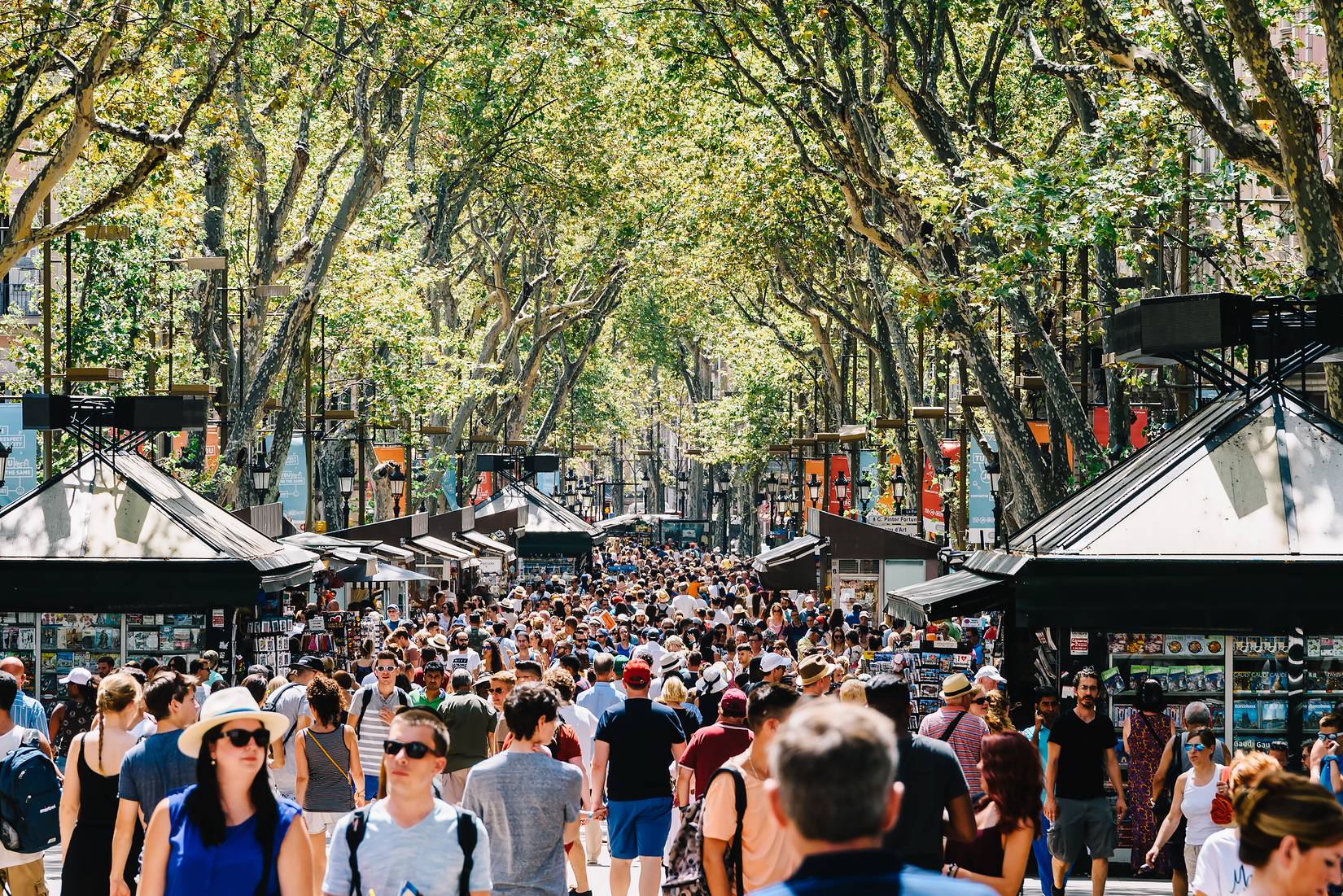 A crowd of people in central Barcelona on La Rambla Street