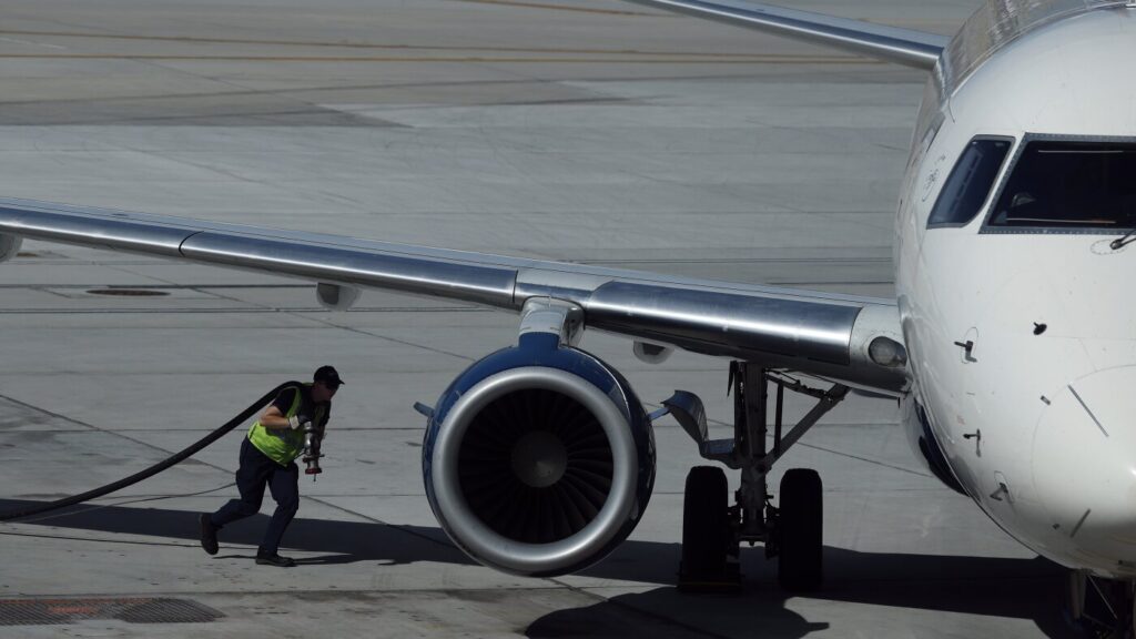 Jet fuel prices double, leading airlines to increase baggage fees, raise fares : NPR