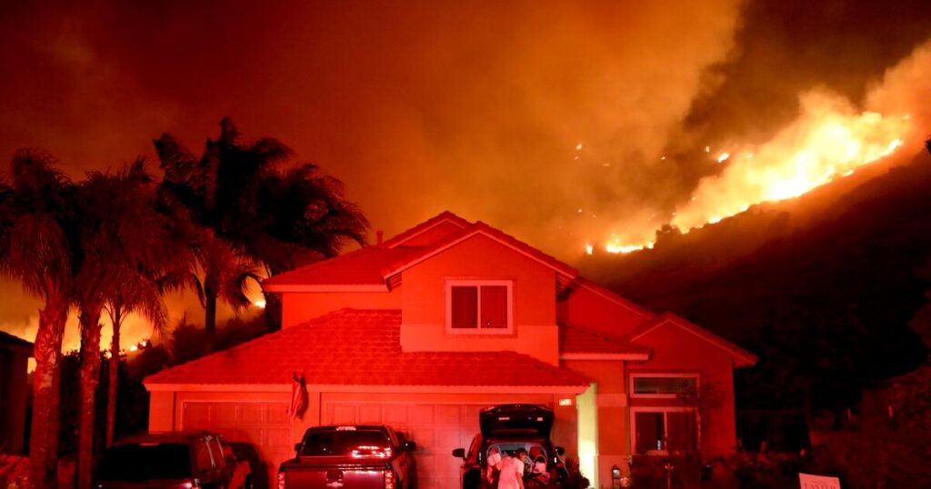 Two fires break out in Southern California amid Santa Ana winds, triggering evacuations