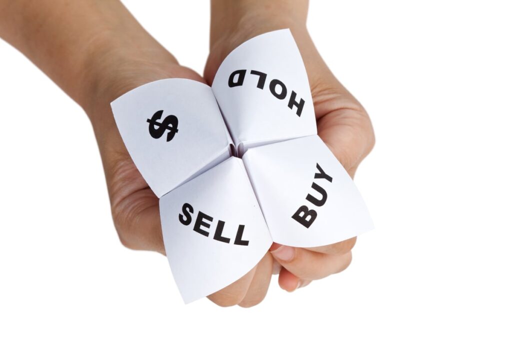 Got $1,000? This Agentic AI Growth Stock Is Down 87% From Its Highs A toy fortune teller with the choices buy, sell, or hold, and a dollar sign.