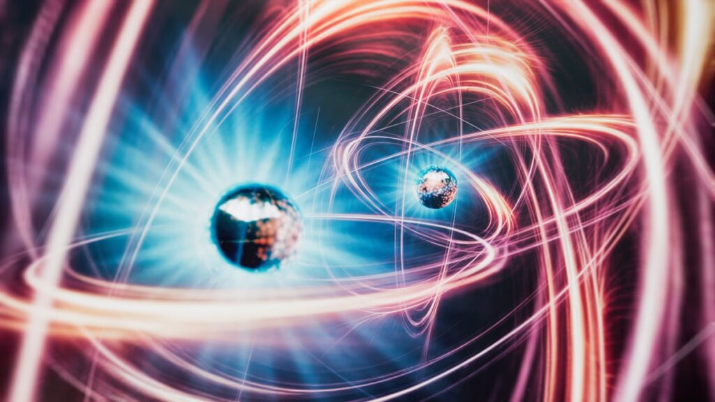 Nuclear Is Back in a Big Way. Here Are 2 Stocks to Consider. Artist's rendering of atoms floating around.