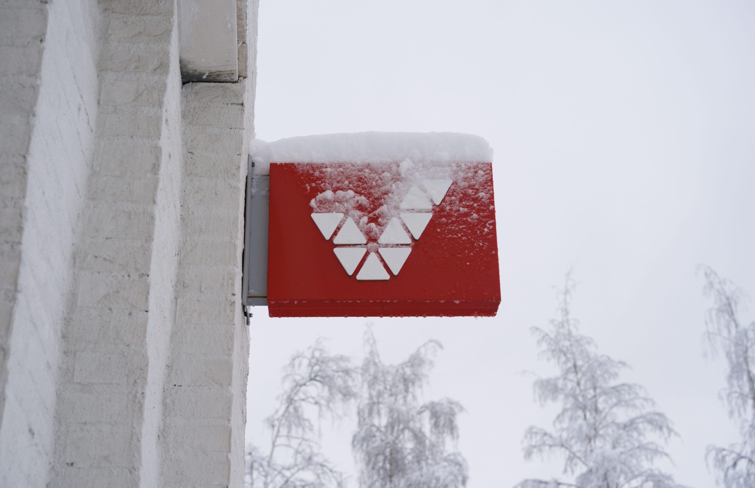 Veikkaus company sign covered in snow