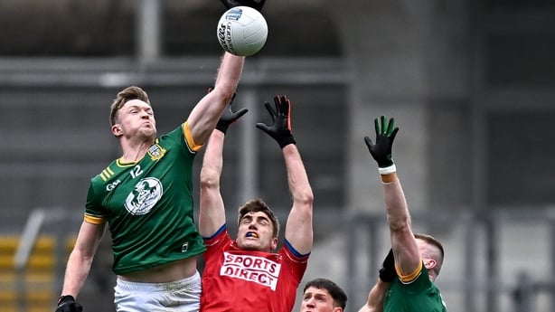 29 March 2026; Ian Maguire of Cork in action against Meath players Cian McBride, left, and Jack Flynn during the Allianz Football League Division 2 final match between Meath and Cork at Croke Park in Dublin. Photo by Seb Daly/Sportsfile