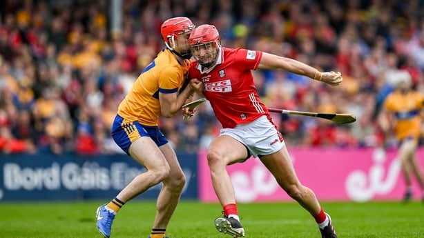 20 April 2025; Brian Hayes of Cork is tackled by Darragh Lohan of Clare during the Munster GAA Hurling Senior Championship Round 1 match between Clare and Cork at Zimmer Biomet Páirc Chíosóg in Ennis, Clare. Photo by Brendan Moran/Sportsfile