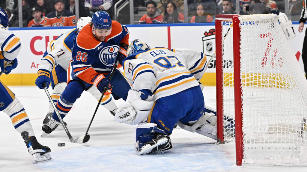 Former Oiler helps Czechia pull away in World Championship opener vs Denmark Dec 9, 2025; Edmonton, Alberta, CAN; Edmonton Oilers right winger David Tomasek 86) shoots the puck against Buffalo Sabres goalie Colten Ellis (92) during the first period at Rogers Place. Mandatory Credit: Walter Tychnowicz-Imagn Images