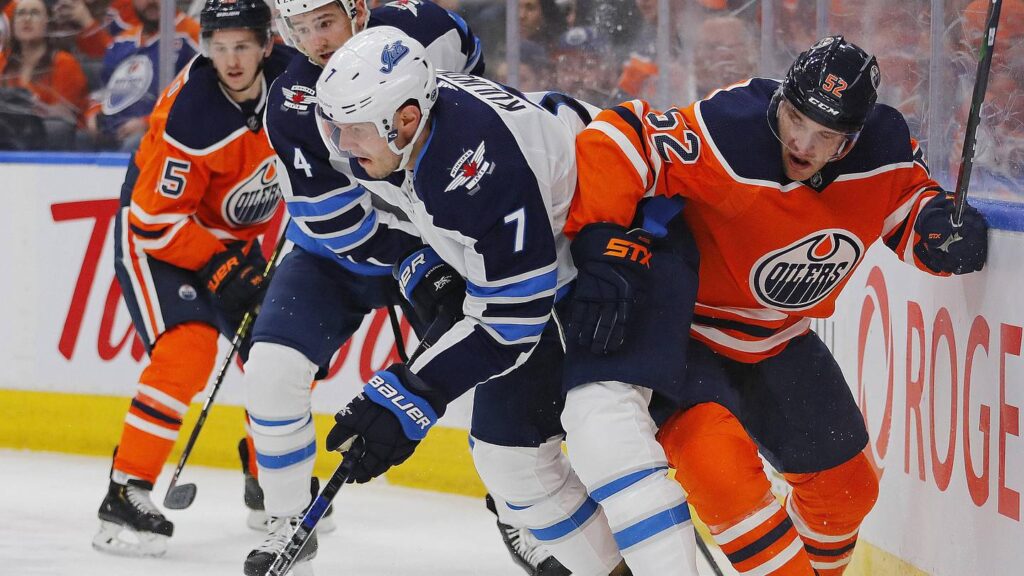 Patrick Russell gives Denmark shootout win over Italy, secures safety from relegation Feb 29, 2020; Edmonton, Alberta, CAN; Winnipeg Jets defensemen Dmitry Kulikov (7) and Edmonton Oilers forward Patrick Russell (52) battle along the boards for a loose puck during the first period at Rogers Place. Mandatory Credit: Perry Nelson-Imagn Images