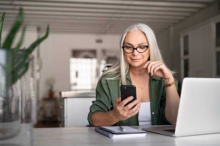 Middle aged woman on her phone