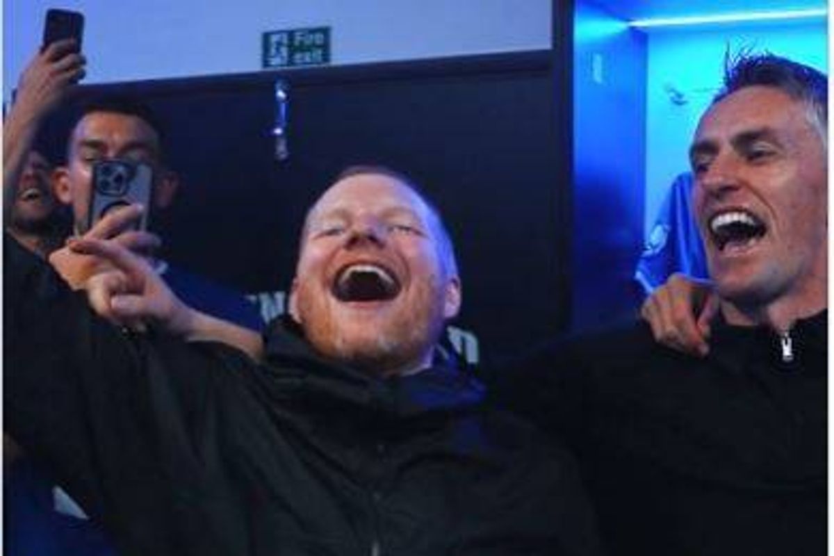 Ed Sheeran celebrated with Ipswich Town stars after their promotion to the Premier League.
